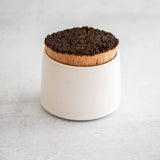 White matte ceramic sugar jar with raw cork lid from Earthen.