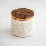 White matte crackle sugar jar with raw cork lid from Earthen.