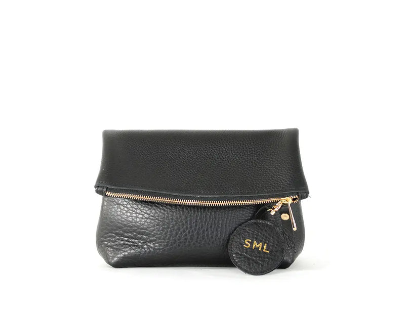 The super-soft black pebble leather Tre clutch by Shana Luther. This one shows a monogrammed key patch, which is not available with this item.