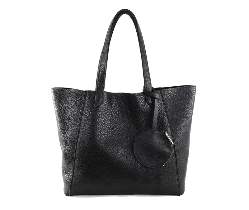 The buttery-soft black pebble leather June tote by Shana Luther. This is the front view, showing the attached coin fob that's perfect for holding keys or your metro pass.