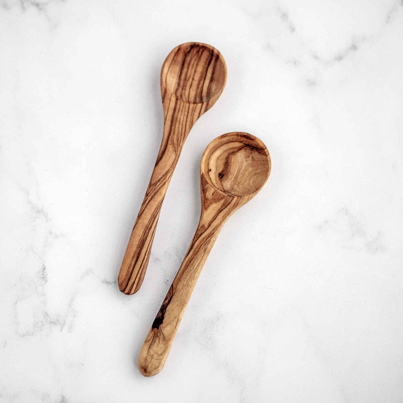 Olive wood mini spoons handcarved by artisans in Morocco. Made as coffee spoons, but we use them for mixing face masks!